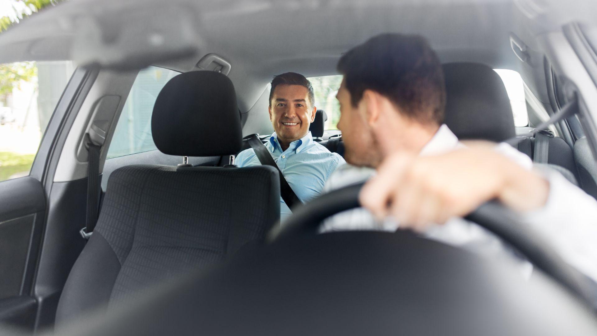 North Shore Limo chauffeur sharing a smile with a passenger