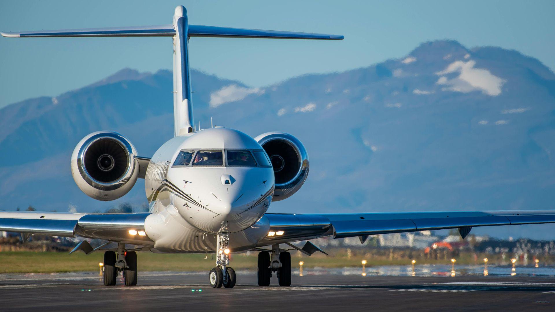 Private jet on the runway — airport transportation to O'Hare and Midway